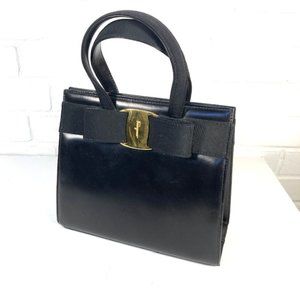 Vintage 1970s/80s Salvatore Ferragamo bow bag made of glove hand top leather